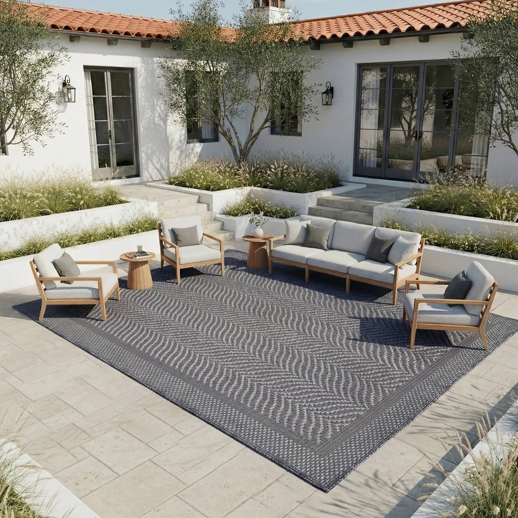 Laguna Indoor/Outdoor — Costco Laguna collection example: Aditi Silver Iron. Manifest design and size unconfirmed.